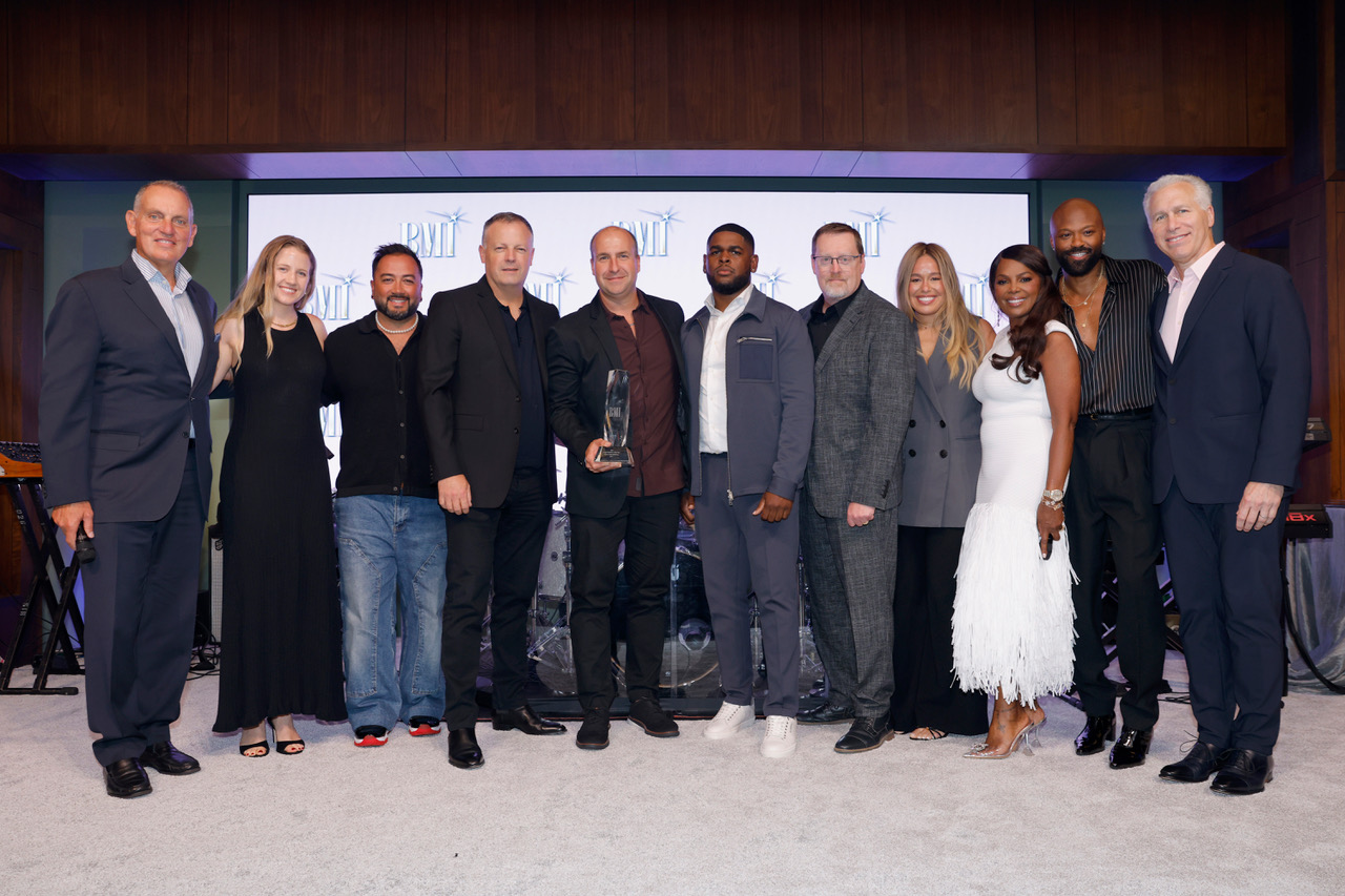 BMI leadership and honorees gather with an award at the 2026 BMI Trailblazers of Gospel Music Awards