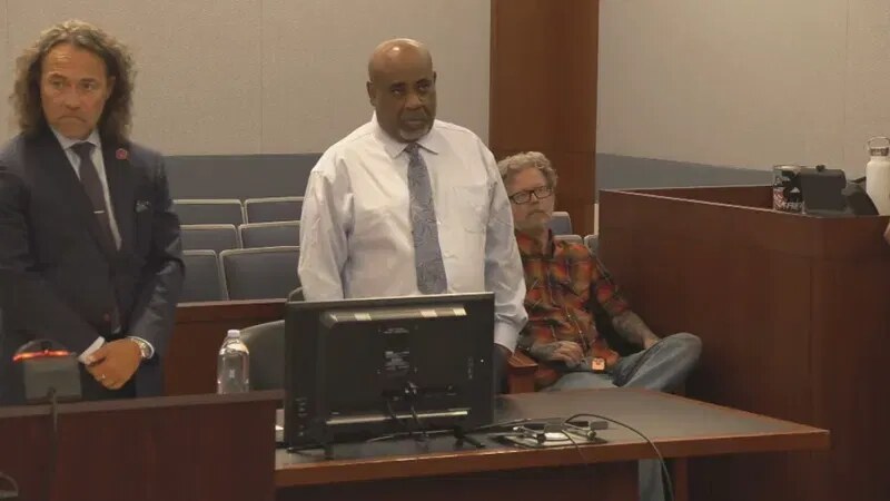 Duane &ldquo;Keffe D&rdquo; Davis standing beside his attorney in a Las Vegas courtroom